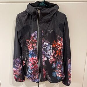 Black with floral LULULEMON Get up and Glow running jacket size 6